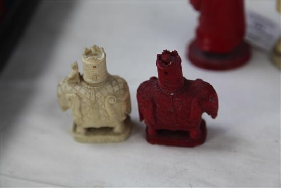 A 19th century Macau carved and stained ivory chess set, king 4.75in.